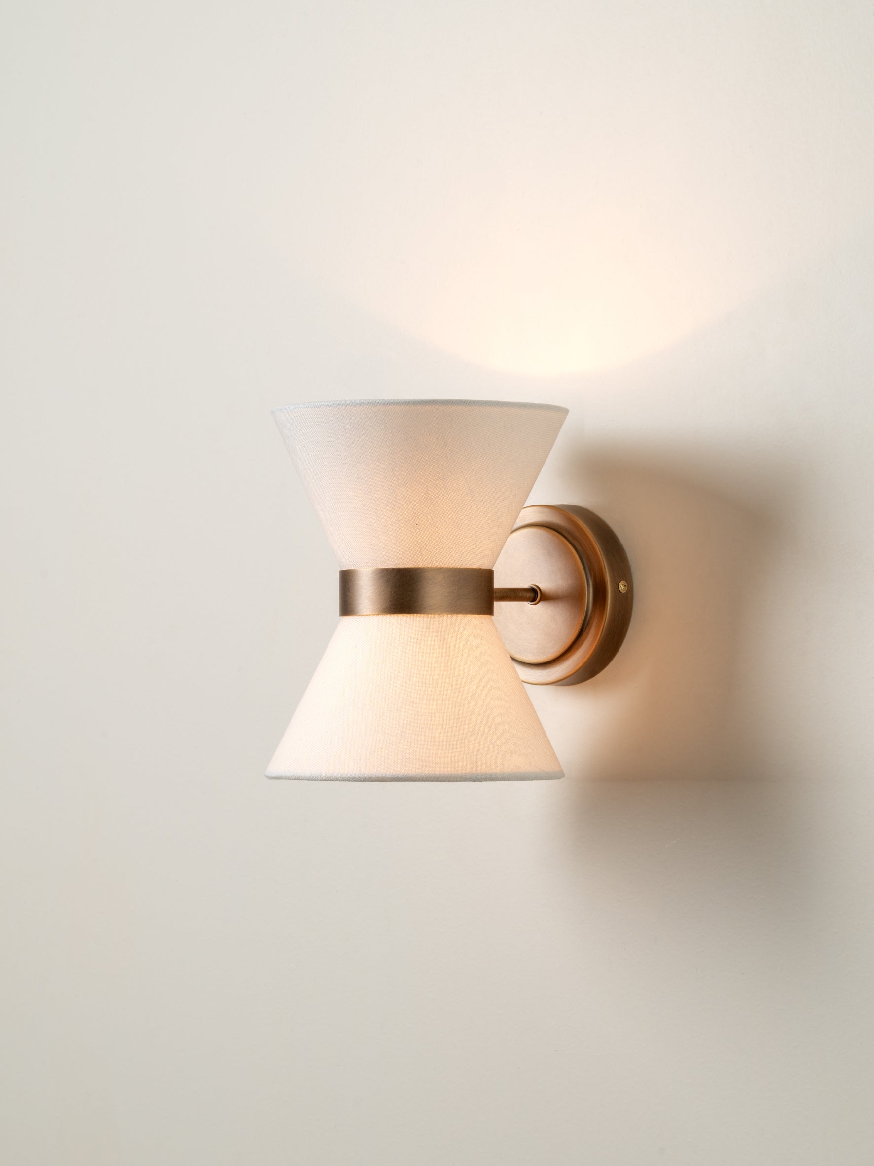 Renwick aged brass wall light